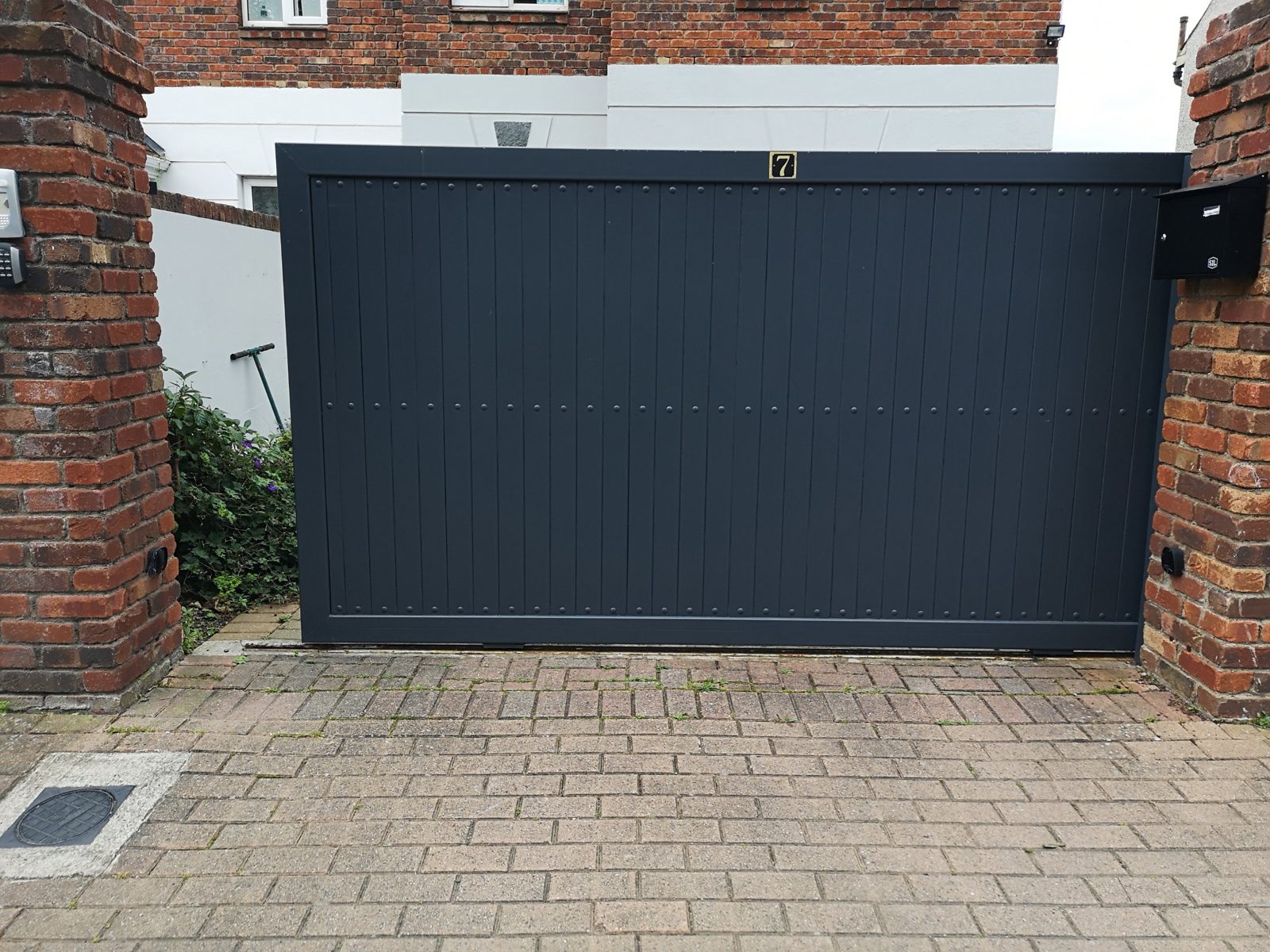 Boarded sliding gates like these for homes in Portadown